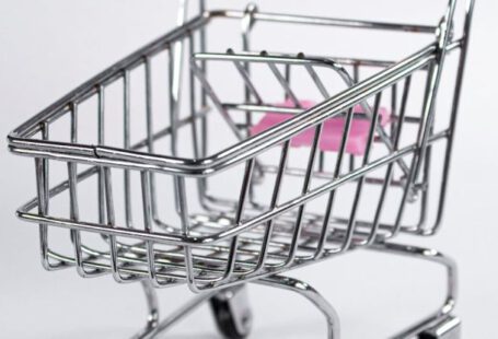 Bulk Shopping - A small pink shopping cart with a handle