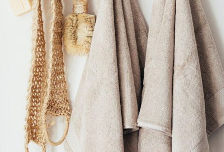 Sustainable Garments - Set of body care tools with towels on hanger