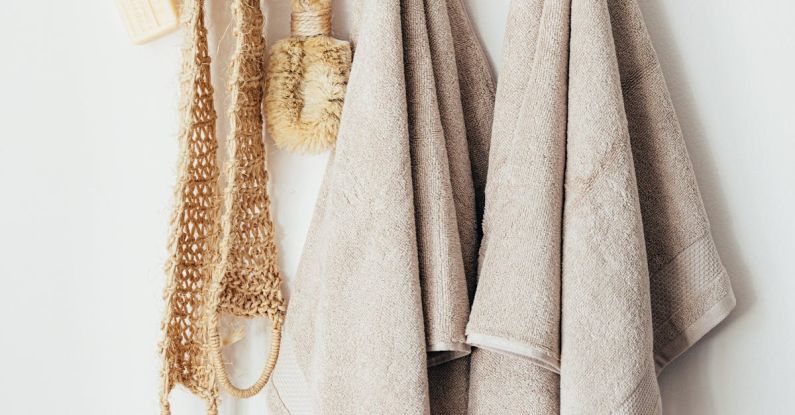 Sustainable Garments - Set of body care tools with towels on hanger
