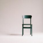 Minimalism - Wooden Chair on a White Wall Studio