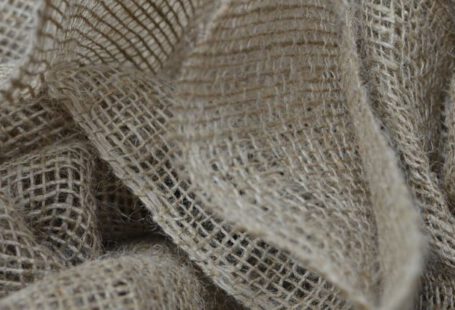 Textile Recycling - Textured backdrop of eco sackcloth with crumpled surface